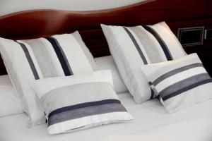 Postel nebo postele na pokoji v ubytování Hotel Plaça