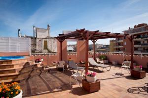 Bazén v ubytování Hotel Plaça nebo v jeho okolí
