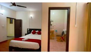 Ένα ή περισσότερα κρεβάτια σε δωμάτιο στο Hotel Juju