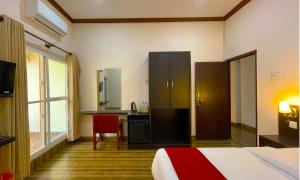 Ένα ή περισσότερα κρεβάτια σε δωμάτιο στο Hotel Juju