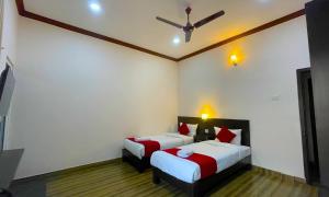 Ένα ή περισσότερα κρεβάτια σε δωμάτιο στο Hotel Juju