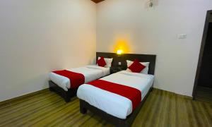Ένα ή περισσότερα κρεβάτια σε δωμάτιο στο Hotel Juju