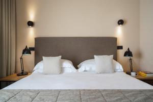 Postel nebo postele na pokoji v ubytování Hotel Select Suites & Spa - Apartments