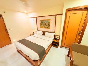Postel nebo postele na pokoji v ubytování Hotel Vice President