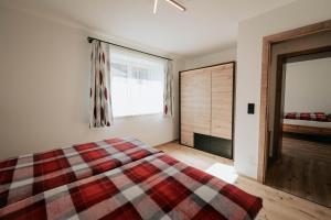 A bed or beds in a room at Wieserhof