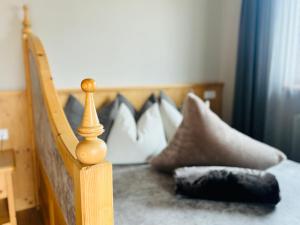 Postel nebo postele na pokoji v ubytování Naturhotel Sonnenhof