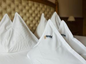 Postel nebo postele na pokoji v ubytování Naturhotel Sonnenhof