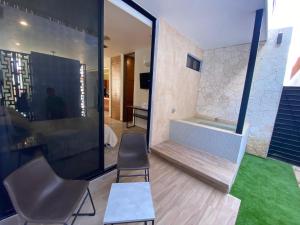 Χώρος καθιστικού στο Penca Suites Valladolid