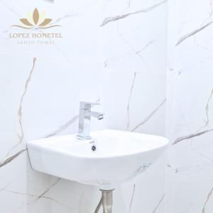 Fotografie z fotogalerie ubytování Lopez Hometel v destinaci Santo Tomas