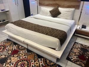 Postel nebo postele na pokoji v ubytování Hotel Amaresh