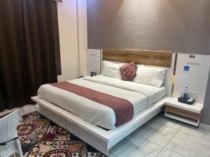 Postel nebo postele na pokoji v ubytování Hotel Amaresh