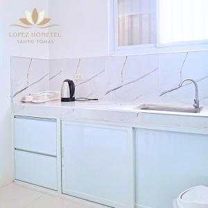 Fotografie z fotogalerie ubytování Lopez Hometel v destinaci Santo Tomas