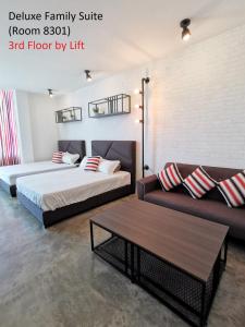 Postel nebo postele na pokoji v ubytování Mwv Family Suite Room