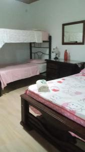 Postel nebo postele na pokoji v ubytování Hospedaje Lulú - Licores 24