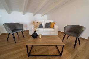 A seating area at San Martino Holiday Apartments