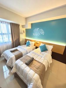 Katil atau katil-katil dalam bilik di Chic Overlooking Studio at Horizons 101 +5 gambar