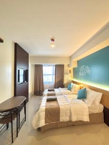 Katil atau katil-katil dalam bilik di Chic Overlooking Studio at Horizons 101