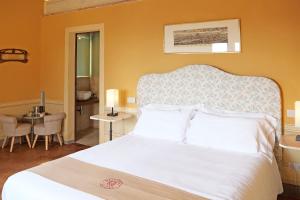 Voodi või voodid majutusasutuse Delcorto Suites toas