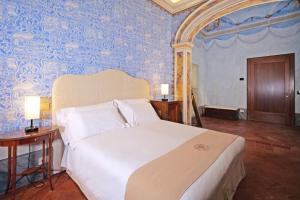 Voodi või voodid majutusasutuse Delcorto Suites toas