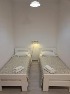 Posteľ alebo postele v izbe v ubytovaní Summer Bay Apartments