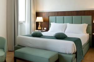 Letto o letti in una camera di AGH Babuino