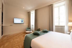 Letto o letti in una camera di AGH Babuino