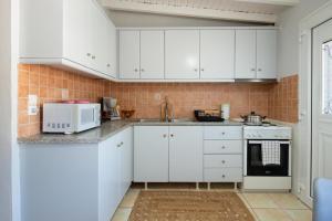 Køkken eller tekøkken på Seafront studio + 6 billeder