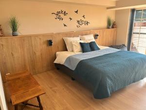 Postel nebo postele na pokoji v ubytování Le Sommelet