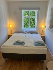 Postel nebo postele na pokoji v ubytování Cosy rooms & garden