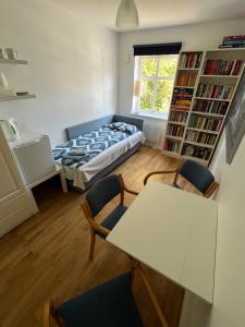 Posezení v ubytování Cosy rooms & garden