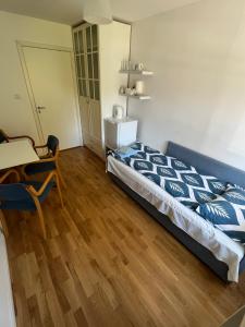 Postel nebo postele na pokoji v ubytování Cosy rooms & garden