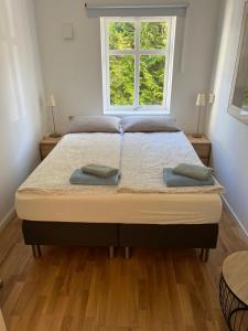 Postel nebo postele na pokoji v ubytování Cosy rooms & garden