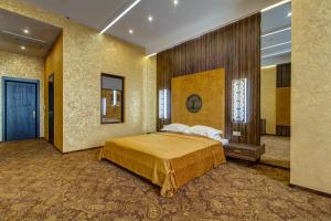 Postel nebo postele na pokoji v ubytování Khan-Chinar Hotel + 37 fotografií