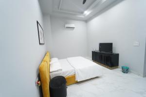Letto o letti in una camera di Crazzy Days Hotel I Sonipat