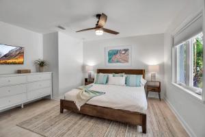 En eller flere senge i et værelse på Blissful Bungalow + 49 billeder