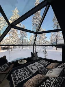Ένα ή περισσότερα κρεβάτια σε δωμάτιο στο Aurora Queen Resort Igloos