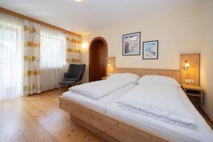 Postel nebo postele na pokoji v ubytování Pension Appartments Christoph