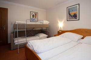 Postel nebo postele na pokoji v ubytování Pension Appartments Christoph