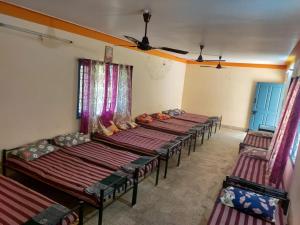 Letto o letti in una camera di Mysuru-hotel