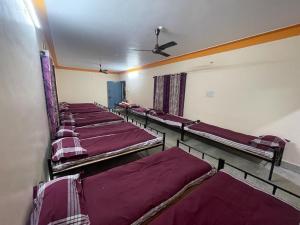 Letto o letti in una camera di Mysuru-hotel