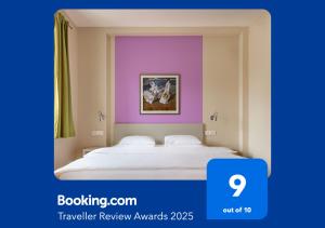 Posteľ alebo postele v izbe v ubytovaní Boutique Hotel SwissHouse