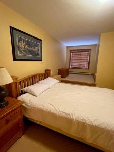 Postel nebo postele na pokoji v ubytování Townhouse, Ski in Ski out + 16 fotografií