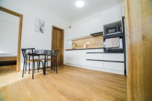 Kuchyň nebo kuchyňský kout v ubytování apartmány MAJKA