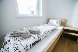 Postel nebo postele na pokoji v ubytování apartmány MAJKA
