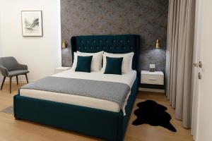 Postel nebo postele na pokoji v ubytování Hotel Capital Inn Tirana