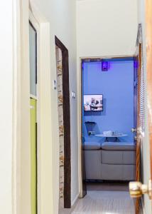 TV a/nebo společenská místnost v ubytování KGL Shortlet Apartment