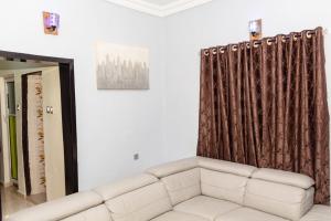 Posezení v ubytování KGL Shortlet Apartment