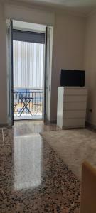 TV a/nebo společenská místnost v ubytování Bisceglie Apartment + 8 fotografií
