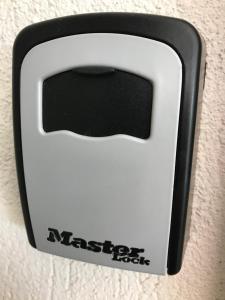 a nintendo switch with a black and white handle at Lovely place in Perea in Perea