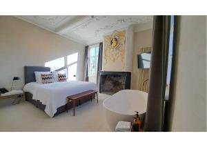 Postel nebo postele na pokoji v ubytování Hotel Montanus